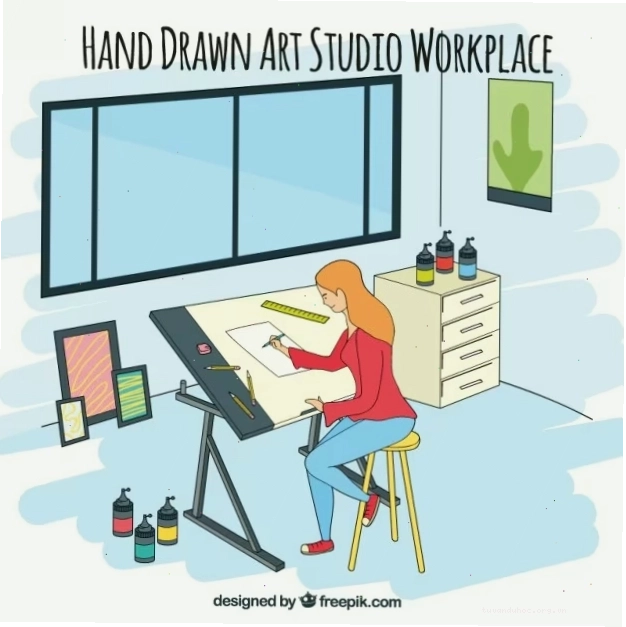 Young artist working on architectural illustrations in a bright studio