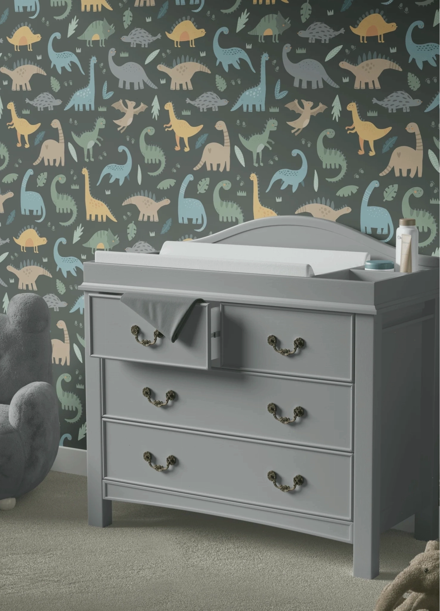 Dinosaur-themed wall decor in a child room with neutral colors